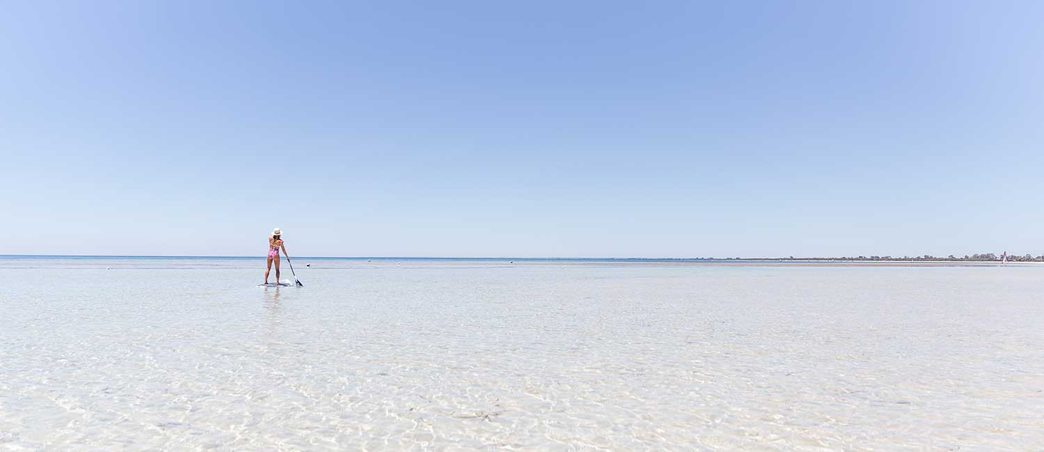 Paddle boarding along the calm waters of Geographe Bay, Dunsborough WA
